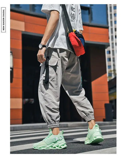 Hot Sale Fashion Purple Casual Sneakers Women Men Blade Running Shoes Big Size 48 Light Breathable Sports Shoes Men Mesh Sneakers