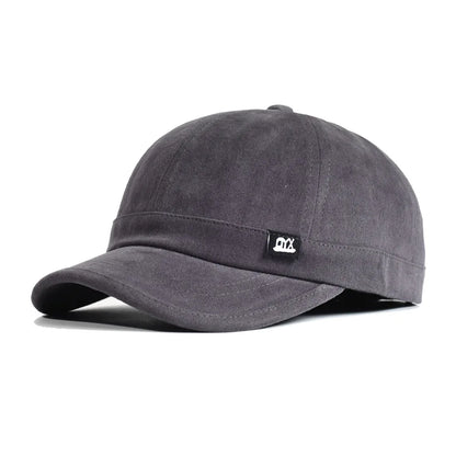 Vintage baseballkasket med kort skygge i bomuld til mænd og kvinder – blød »dad hat« i justerbar trucker-stil med lav profil