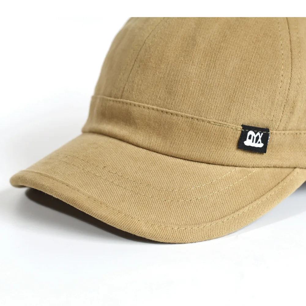 Vintage baseballkasket med kort skygge i bomuld til mænd og kvinder – blød »dad hat« i justerbar trucker-stil med lav profil