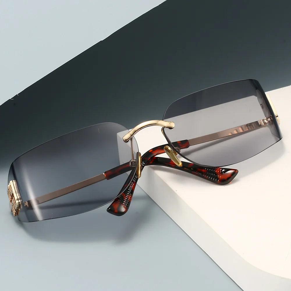 2026 New High End Sunglasses Women Rimless Curved Sun Glasses for Eye Protection and Sunscreen Travelling Hiking Shades Gafas